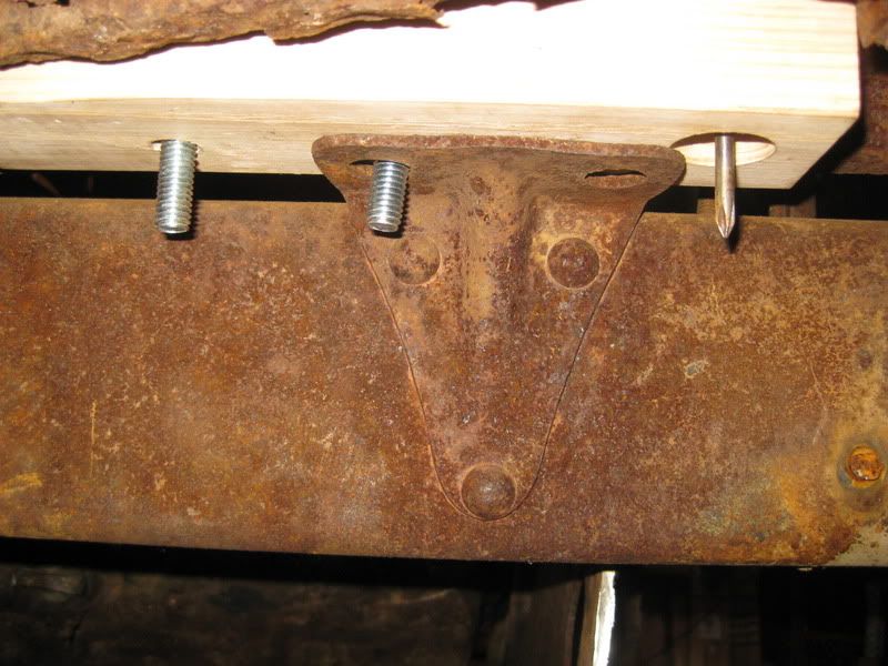 I need a picture of model A wood body mounts installed. The H.A.M.B.